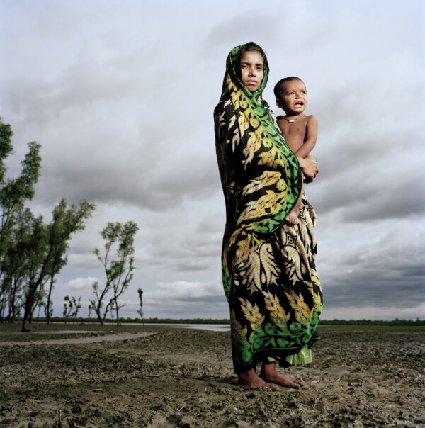 Hosnaara Khatun and her son Chassan,
Tiger Widow,
Sora, Gabura, Bangladesh