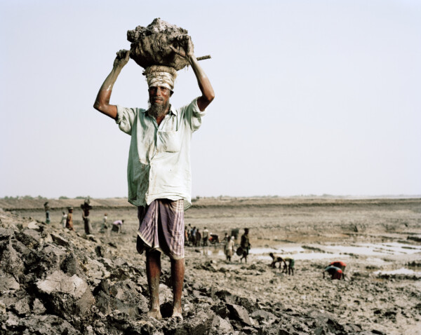 Azizul Islam,
Day Labourer, helping to repair a broken embankment,
Chadnimukha, Gabura, Bangladesh