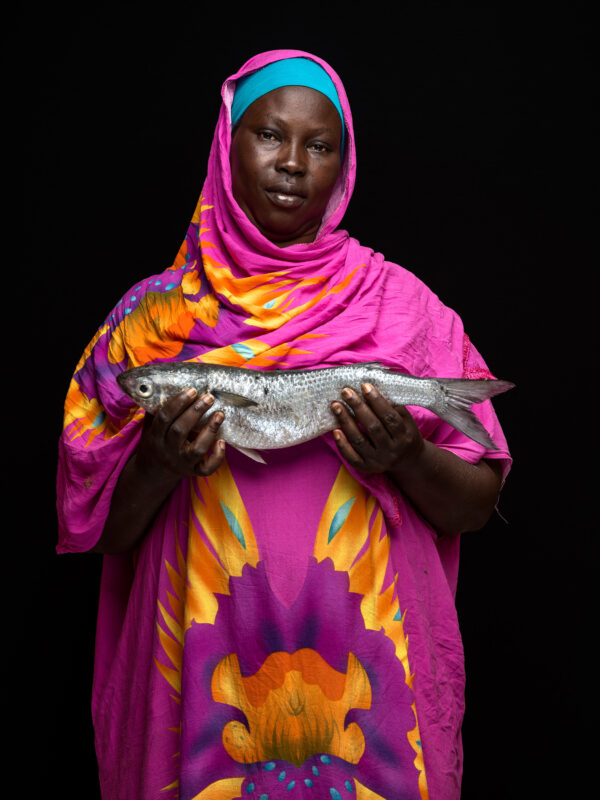 N’Deye Khoudia Ka, 
Lives in Diougop relocation camp new houses, works in Guet Ndar in fish transformation.  
Saint Louis, Senegal